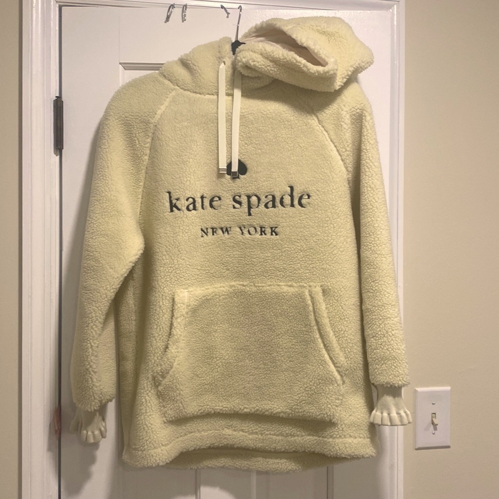 Cream Kate Spade hoodie with black lettering
